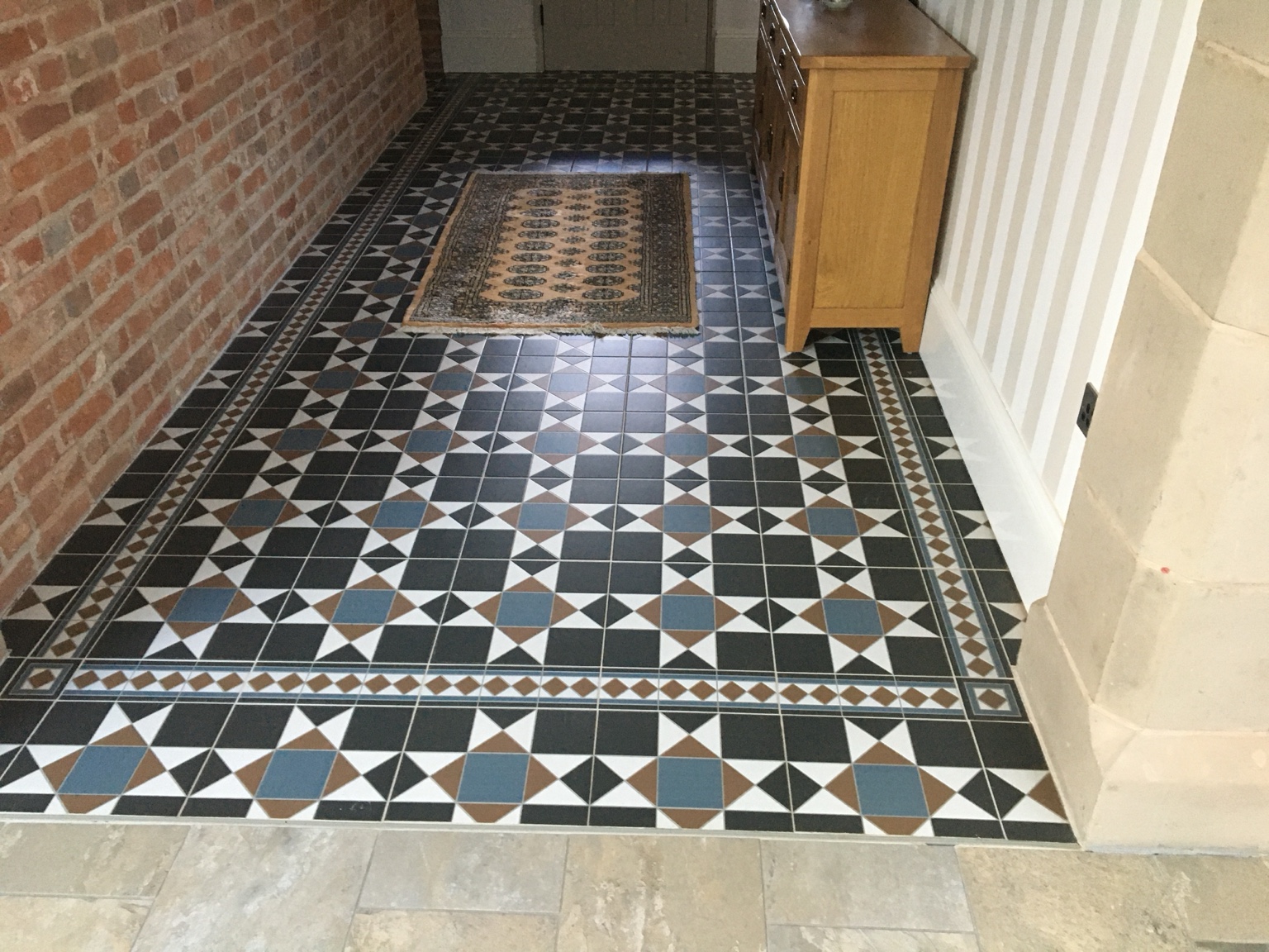 Geometric patterned hallway flooring
